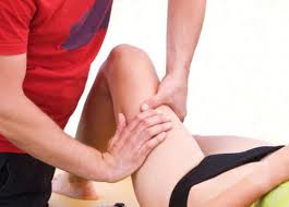 sports therapist in action